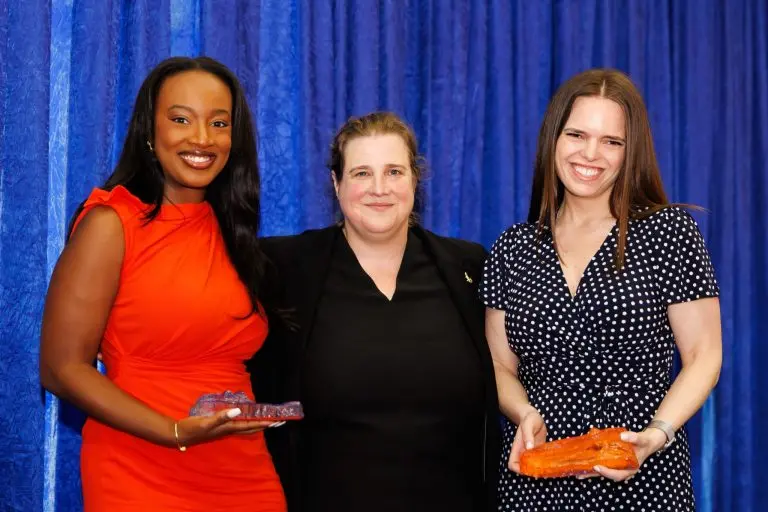 Iesha Nunes (JD 16), UF Law Dean Merritt McAlister, and Jennifer Dweck (JD 17) at the 2025 Past, Present, and Future Ceremony