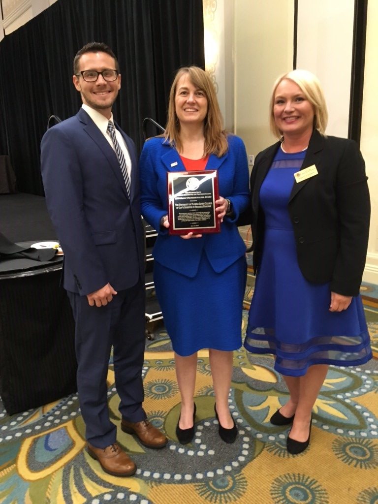 Nate Harvey (JD 18), Dean Laura Rosenbury, and Florida Bar Professionalism Center Director Rebecca Bandy at The Florida Bar annual meeting on June 14, 2018.