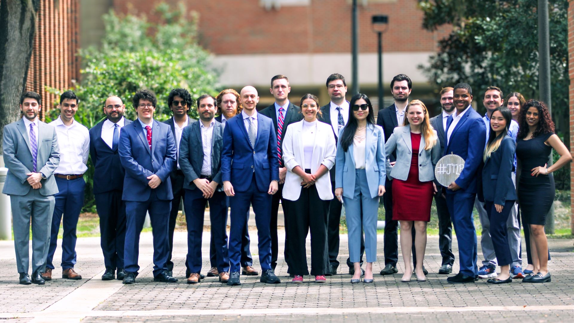 JTLP Group poses outside