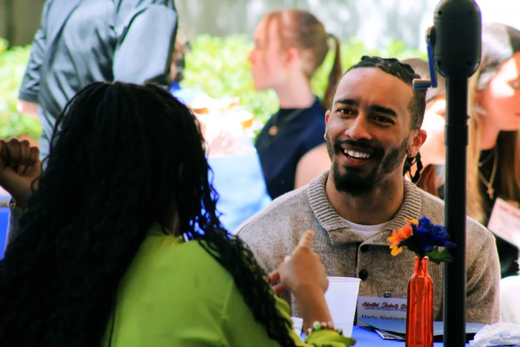 Event attendees mingle outside