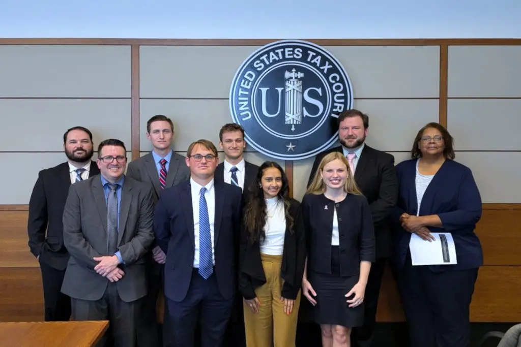 From left to right: Steven Cutler, Professor Derek Wheeler, Andrew Faul, Dominic Vogt, Emily Jamuna, Jenna St. George, John Lomicky, and Emma Ewing.