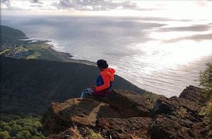 A person overlooking a cliff