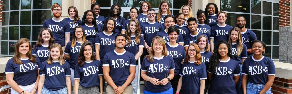 A large group of students all wearing ASB shirts