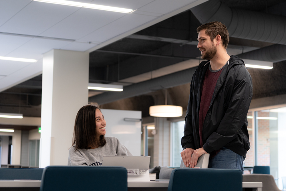 Two students socializing in the Student Life Center
