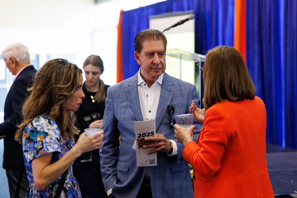 Alumni at a Past, Present, and Future Awards Ceremony