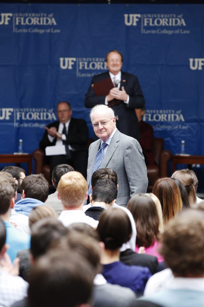 Marshall Criser stands during during the Marshall M. Criser Distinguished Lecture Series which hosted Supreme Court Justice John Paul Stevens in the Marcia Whitney Schott Courtyard on Tuesday, Feb. 5, 2013. (photo by Elise Giordano)