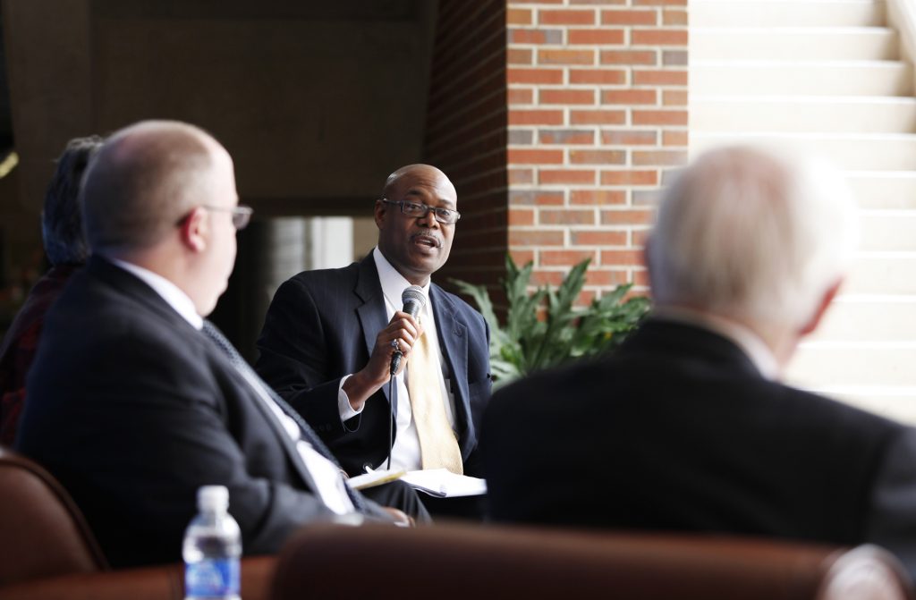 UF Law professor Kenneth Nunn speaks to Supreme Court Justice John Paul Stevens during the Marshall M. Criser Distinguished Lecture Series held in the Marcia Whitney Schott Courtyard on Tuesday, Feb. 5, 2013. (photo by Elise Giordano)