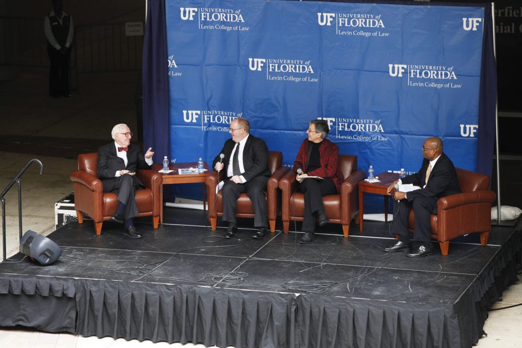 Supreme Court Justice John Paul Stevens speaks with UF Law professors Kenneth Nunn, John Stinneford and Danaya Wright during the Marshall M. Criser Distinguished Lecture Series held in the Marcia Whitney Schott Courtyard on Tuesday, Feb. 5, 2013. (photo by Elise Giordano)