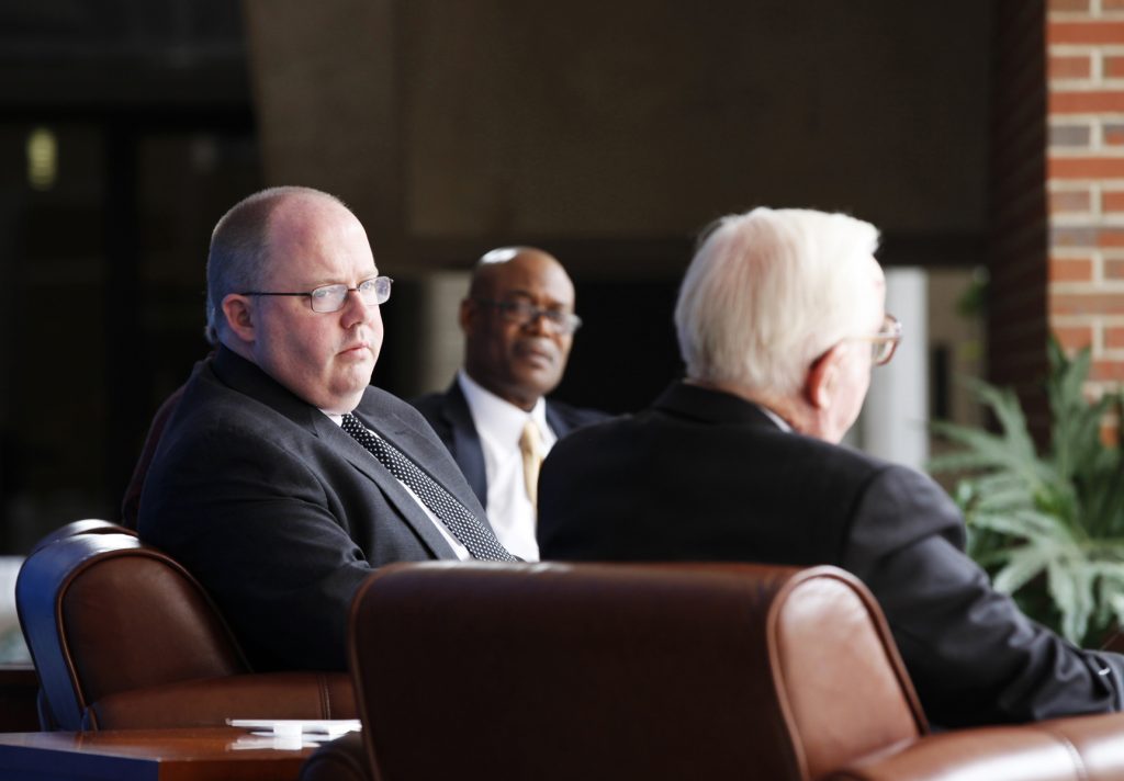 UF Law professor John Stinneford, along with UF Law professors Kenneth Nunn and Danaya Wright, listen to Supreme Court Justice John Paul Stevens during the Marshall M. Criser Distinguished Lecture Series held in the Marcia Whitney Schott Courtyard on Tuesday, Feb. 5, 2013. (photo by Elise Giordano)