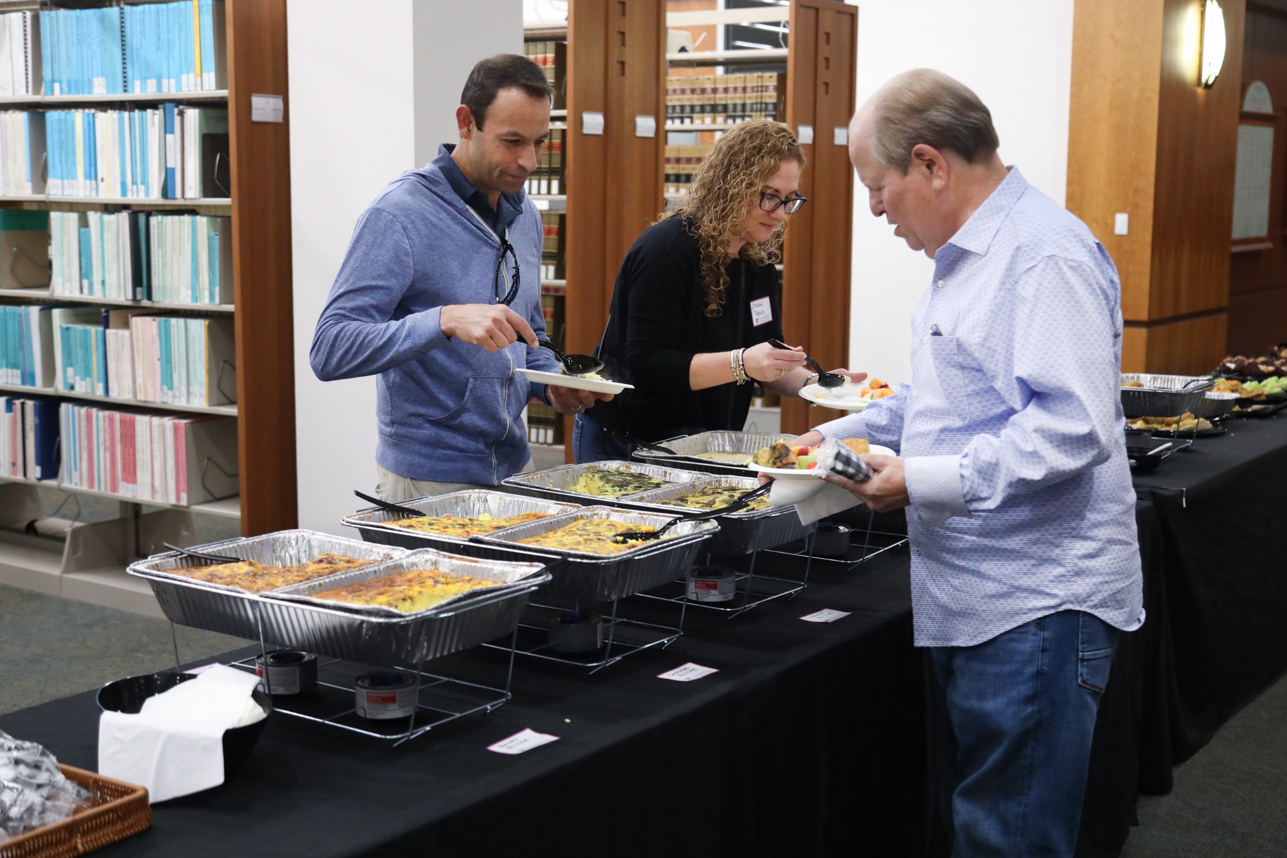 A celebratory brunch was held at UF Law in honor of Professor Dennis Calfee and his 50 years of service to the law school. Attendees enjoyed food and conversation on Saturday, November 16 as Professor Calfee took time to speak with guests.