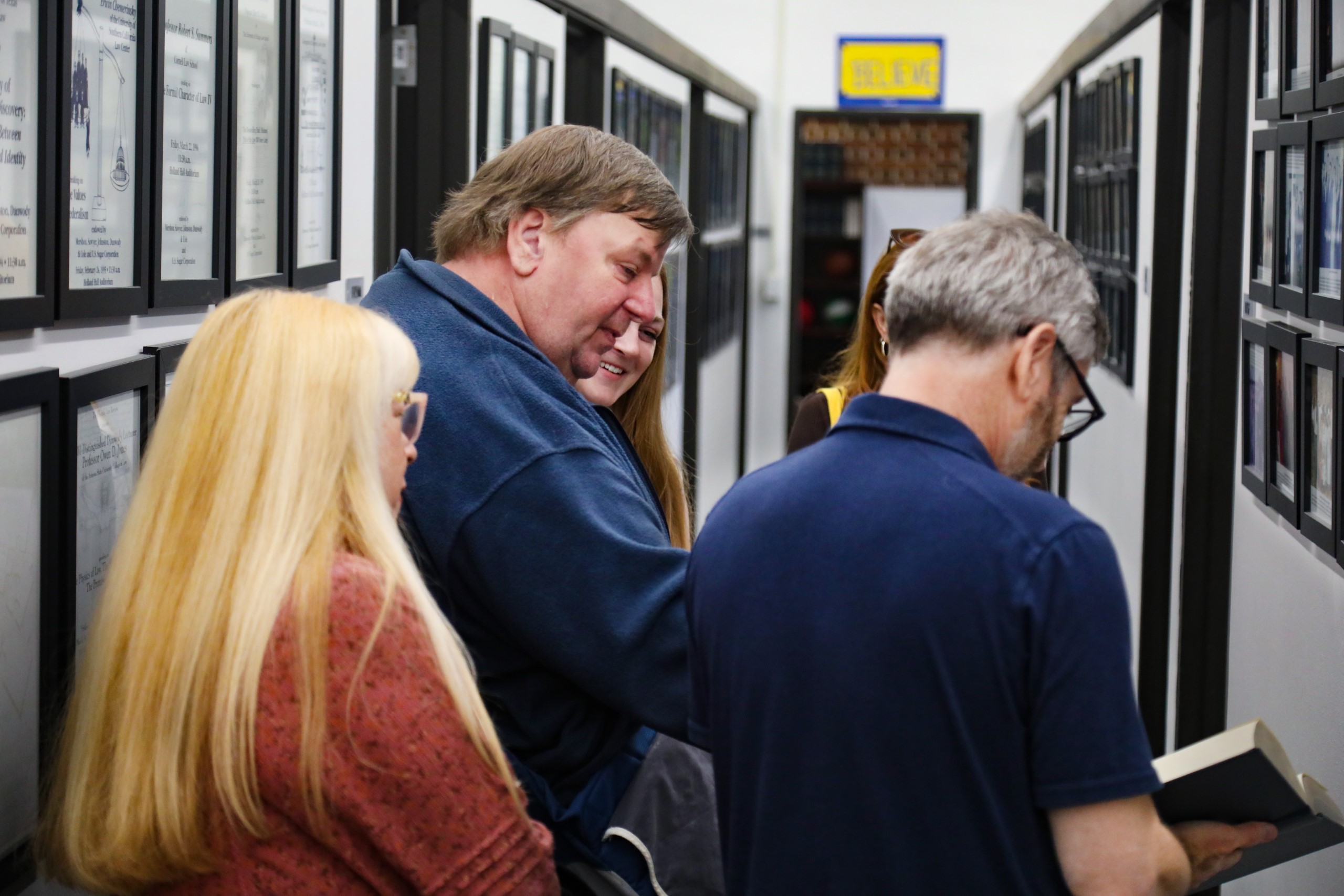 Guests take a tour of UF Law  at a celebratory brunch hosted at UF Law in honor of Professor Dennis Calfee and his 50 years of service to the law school on November 16.