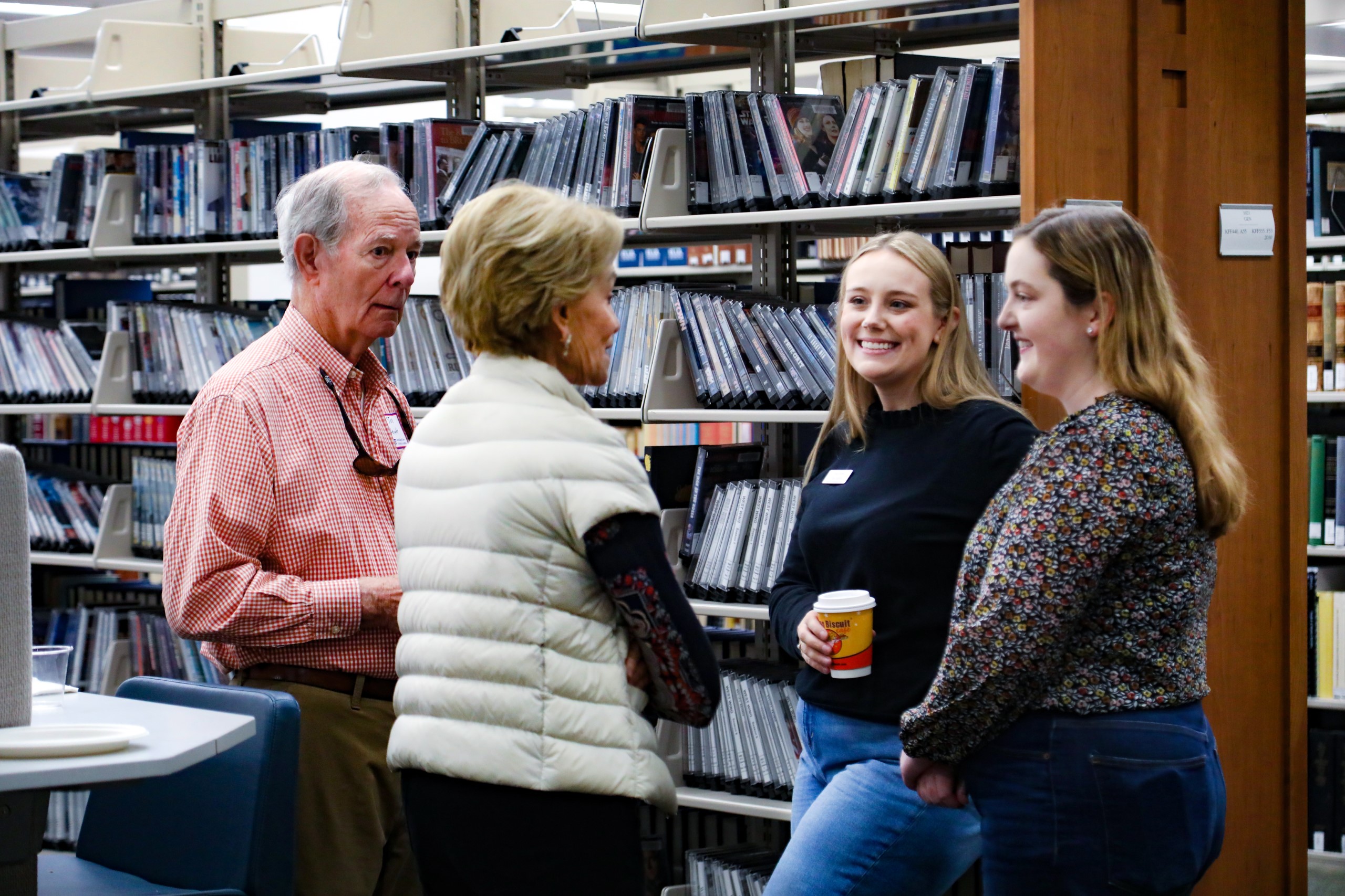 Guests socialize at the celebratory brunch hosted at UF Law in honor of UF Law Professor Dennis Calfee and his 50 years of service to the law school on November 16.