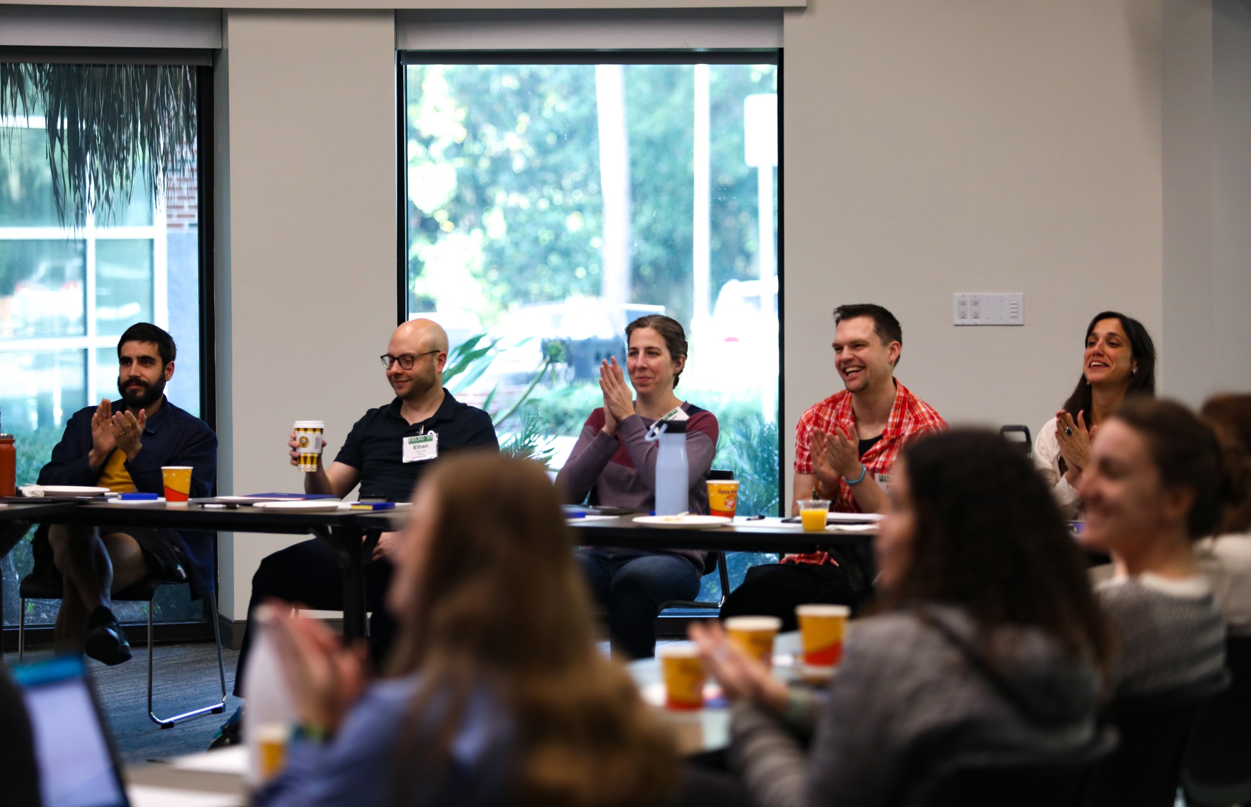 Scholars and faculty members gather inside Bailey Event Space for the Junior Law Conference at UF Law on November 7. 