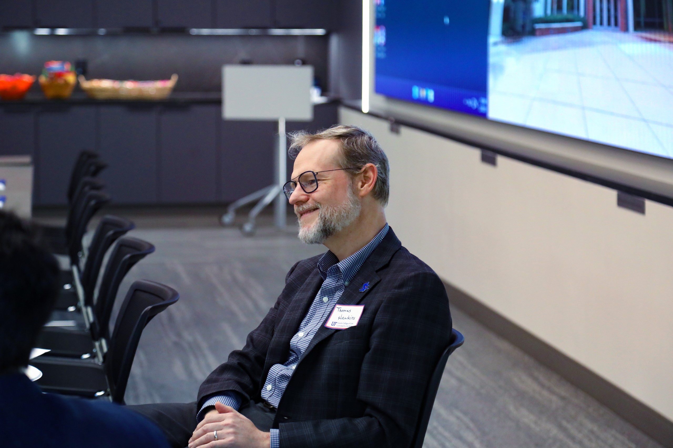 Scholars and faculty members gather inside Bailey Event Space for the Junior Law Conference at UF Law on November 7. 