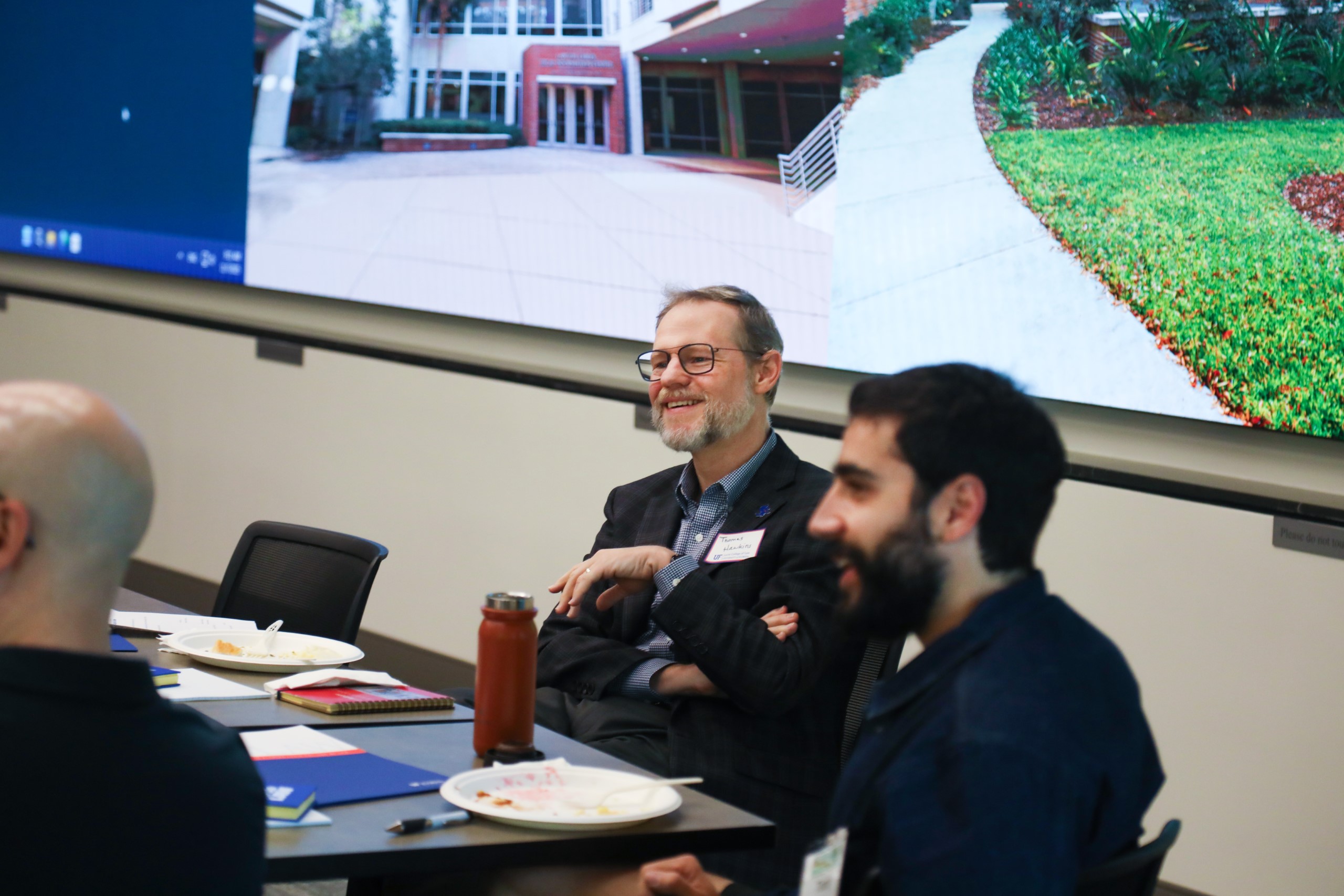 Scholars and faculty members gather inside Bailey Event Space for the Junior Law Conference at UF Law on November 7. 