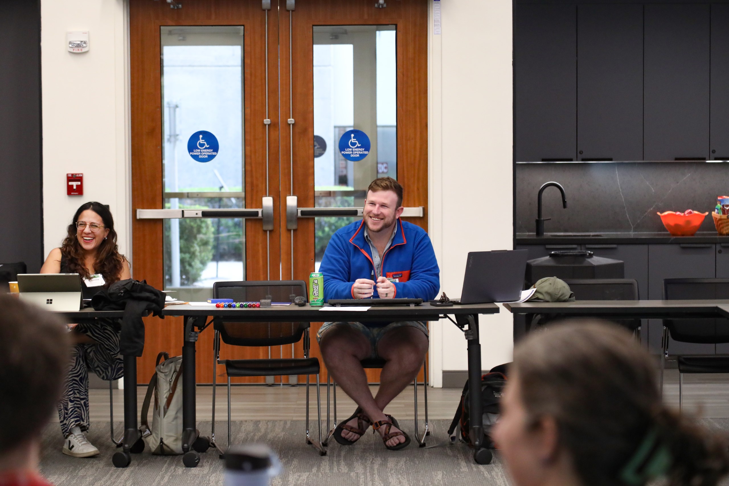 Scholars and faculty members gather inside Bailey Event Space for the Junior Law Conference at UF Law on November 7. 