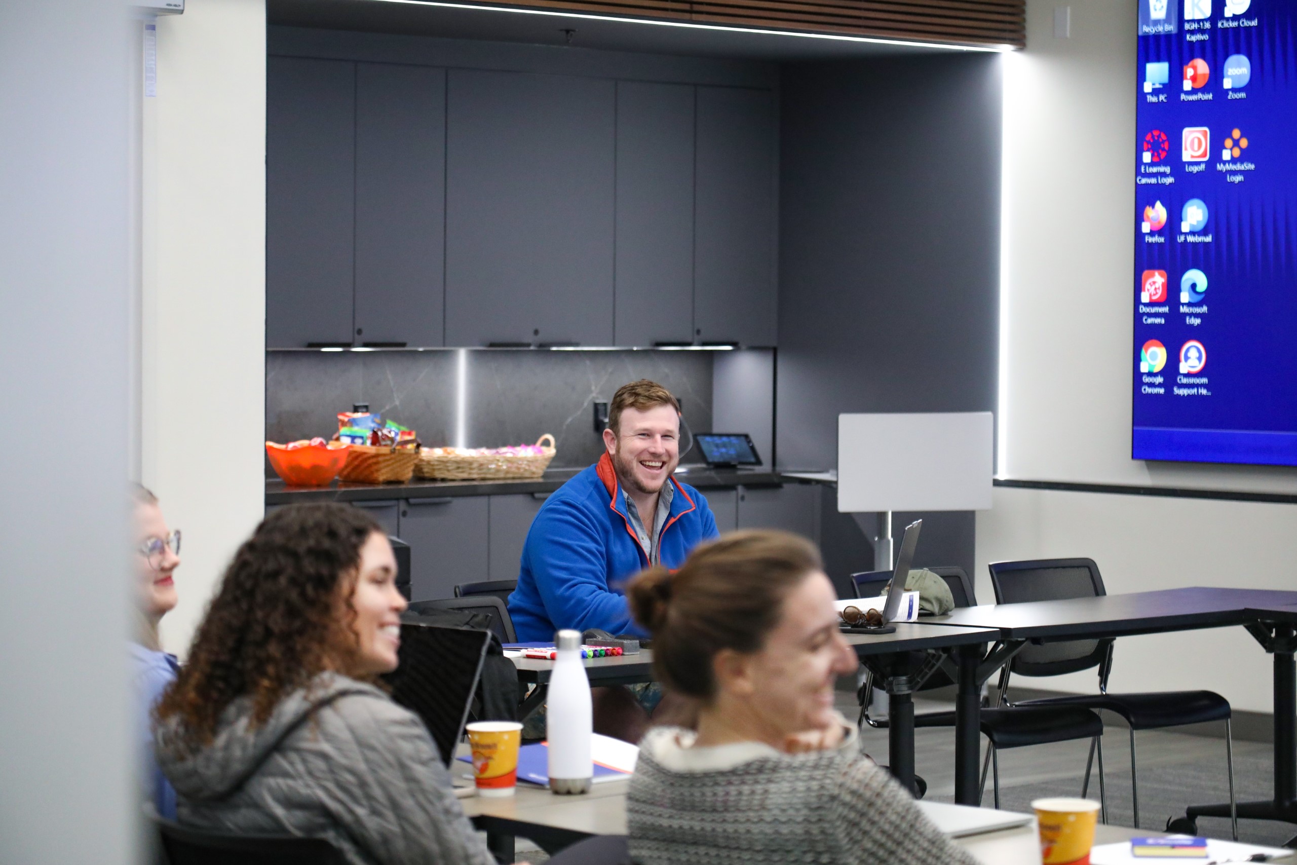 Scholars and faculty members gather inside Bailey Event Space for the Junior Law Conference at UF Law on November 7. 
