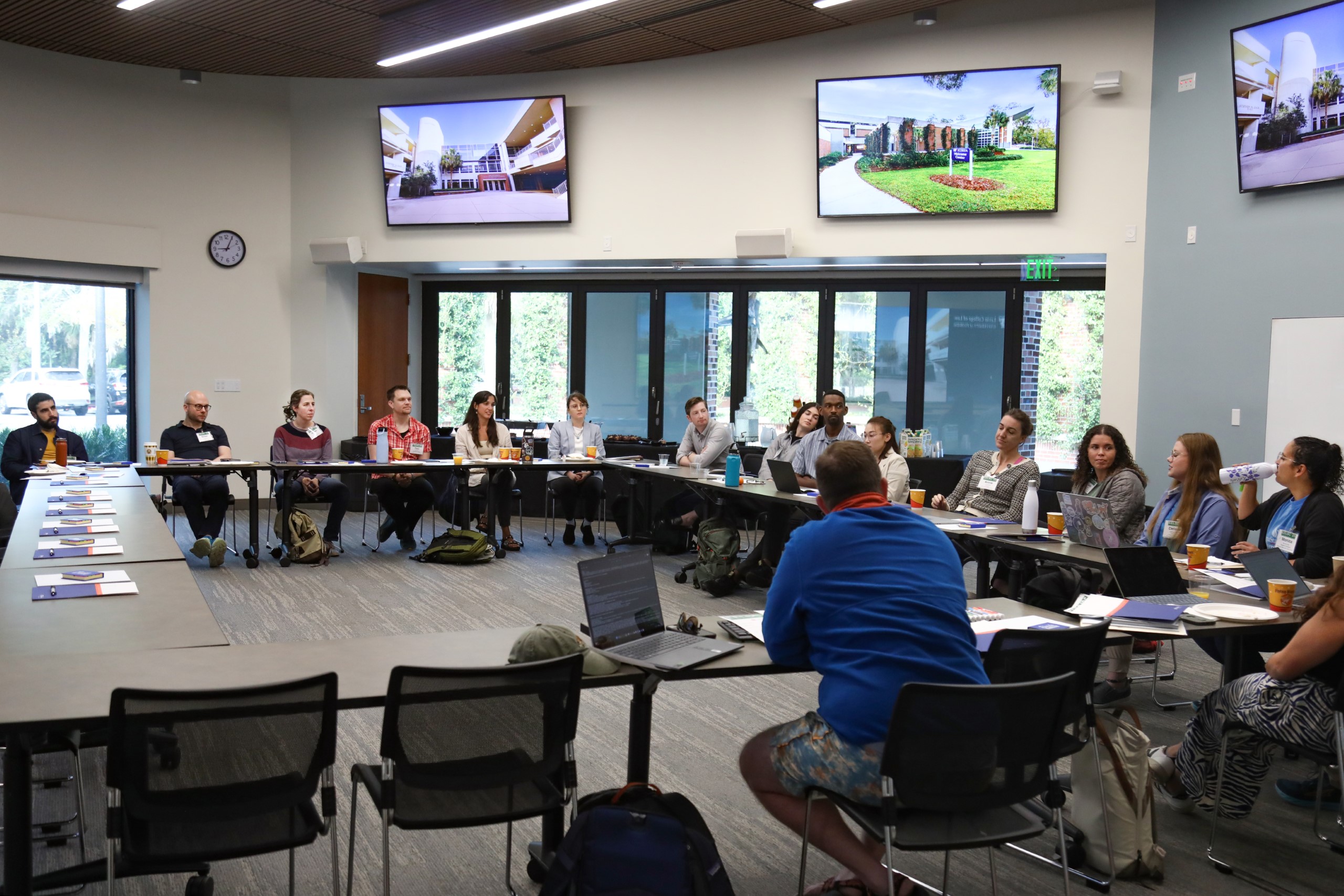 Scholars and faculty members gather inside Bailey Event Space for the Junior Law Conference at UF Law on November 7. 