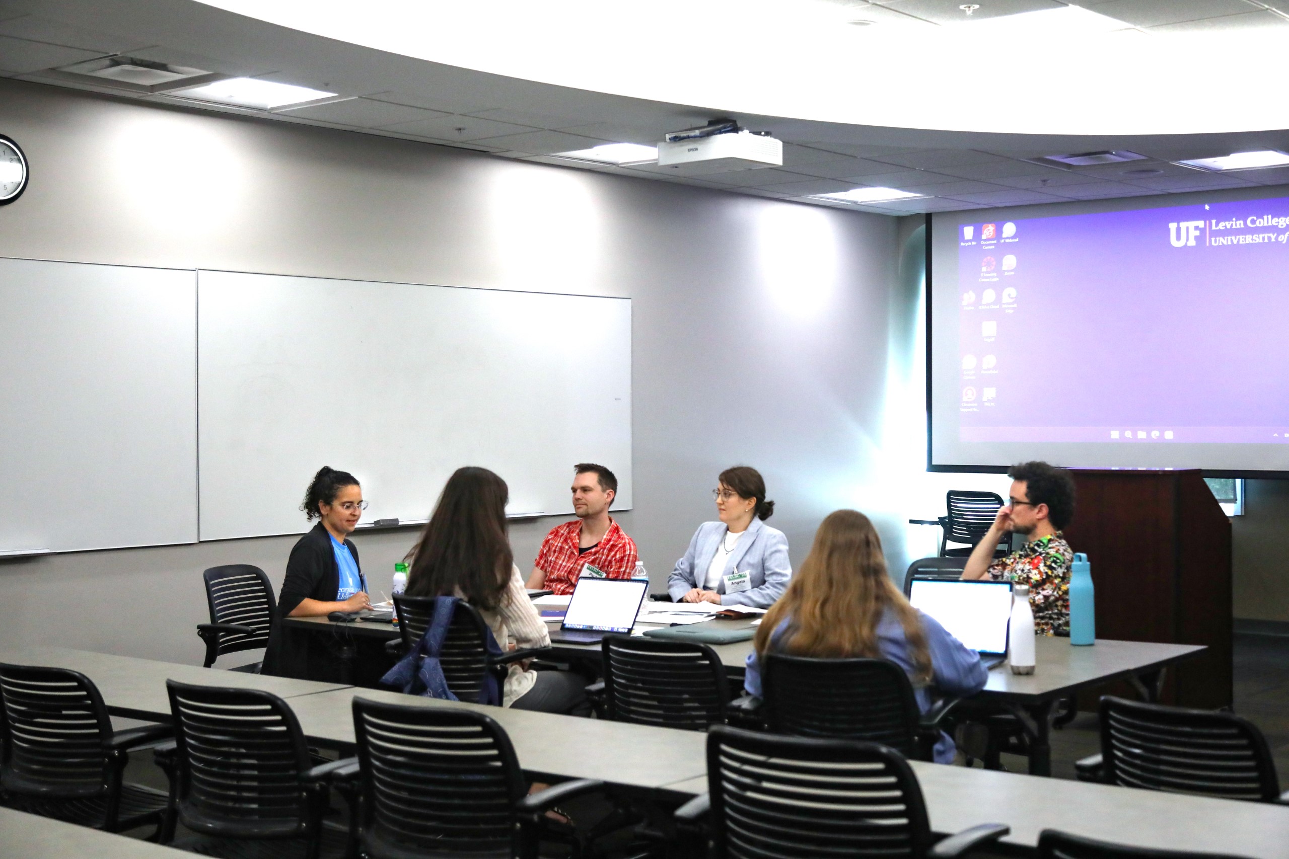 Attendees of the Junior Law Conference at UF Law share ideas and listen during three small-group panels on November 7 at UF Law's Martin Levin Advocacy Center courtrooms. The panels included the Environmental Rights panel with panelists Ethan Prall, Camila Bustos, Tony Derron, Amber Polk, and moderator Thomas Hawkins; the Climate Law panel with panelists Monica Iyer, Angela Hefti, Paul Rink, and moderator Sam Bookman; and the Water Law and Financial Incentives panel with panelists Valentina Wagner, Annie Brett, Adam Orford, and moderator Alex Erwin.