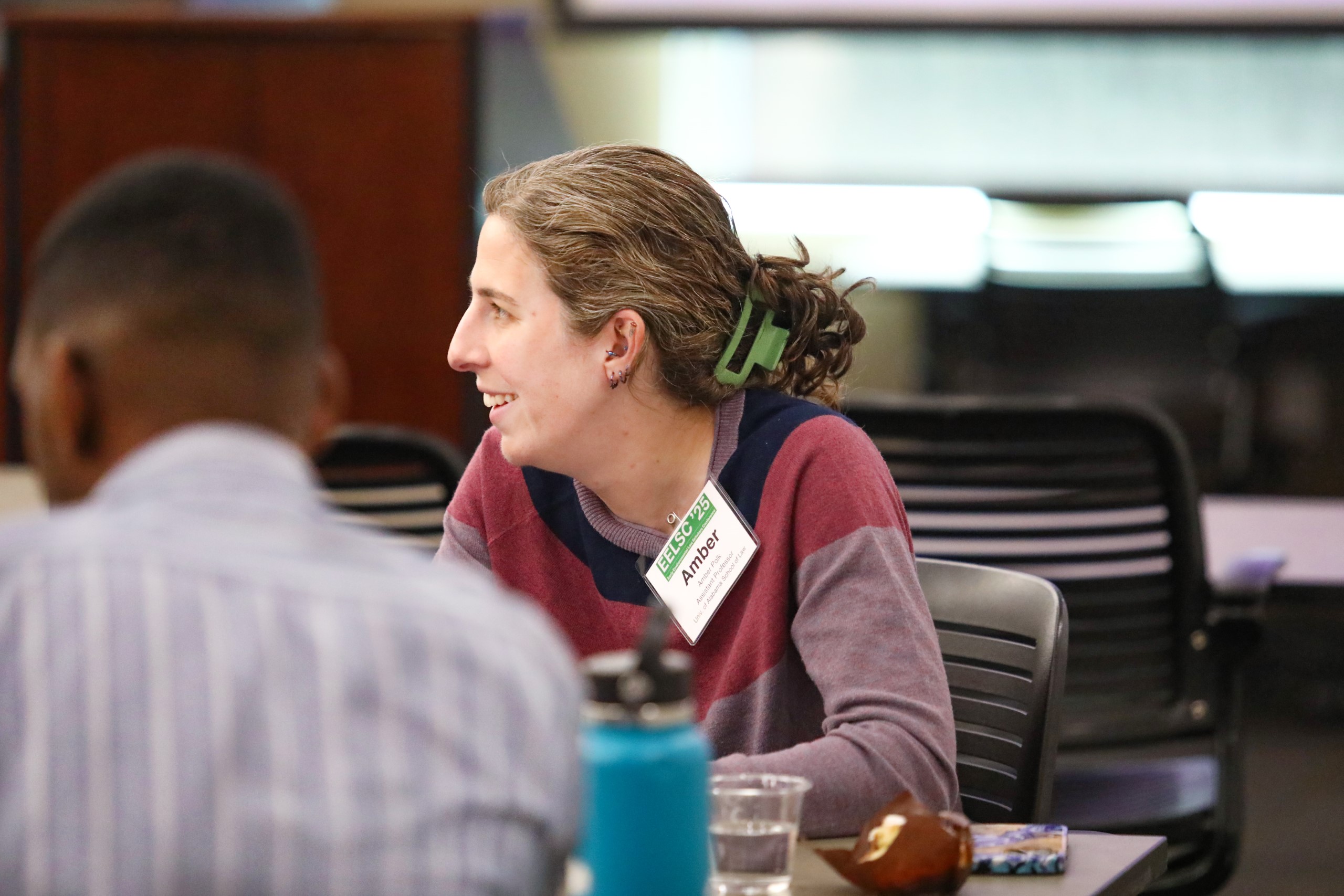 Attendees of the Junior Law Conference at UF Law share ideas and listen during three small-group panels on November 7 at UF Law's Martin Levin Advocacy Center courtrooms. The panels included the Environmental Rights panel with panelists Ethan Prall, Camila Bustos, Tony Derron, Amber Polk, and moderator Thomas Hawkins; the Climate Law panel with panelists Monica Iyer, Angela Hefti, Paul Rink, and moderator Sam Bookman; and the Water Law and Financial Incentives panel with panelists Valentina Wagner, Annie Brett, Adam Orford, and moderator Alex Erwin.