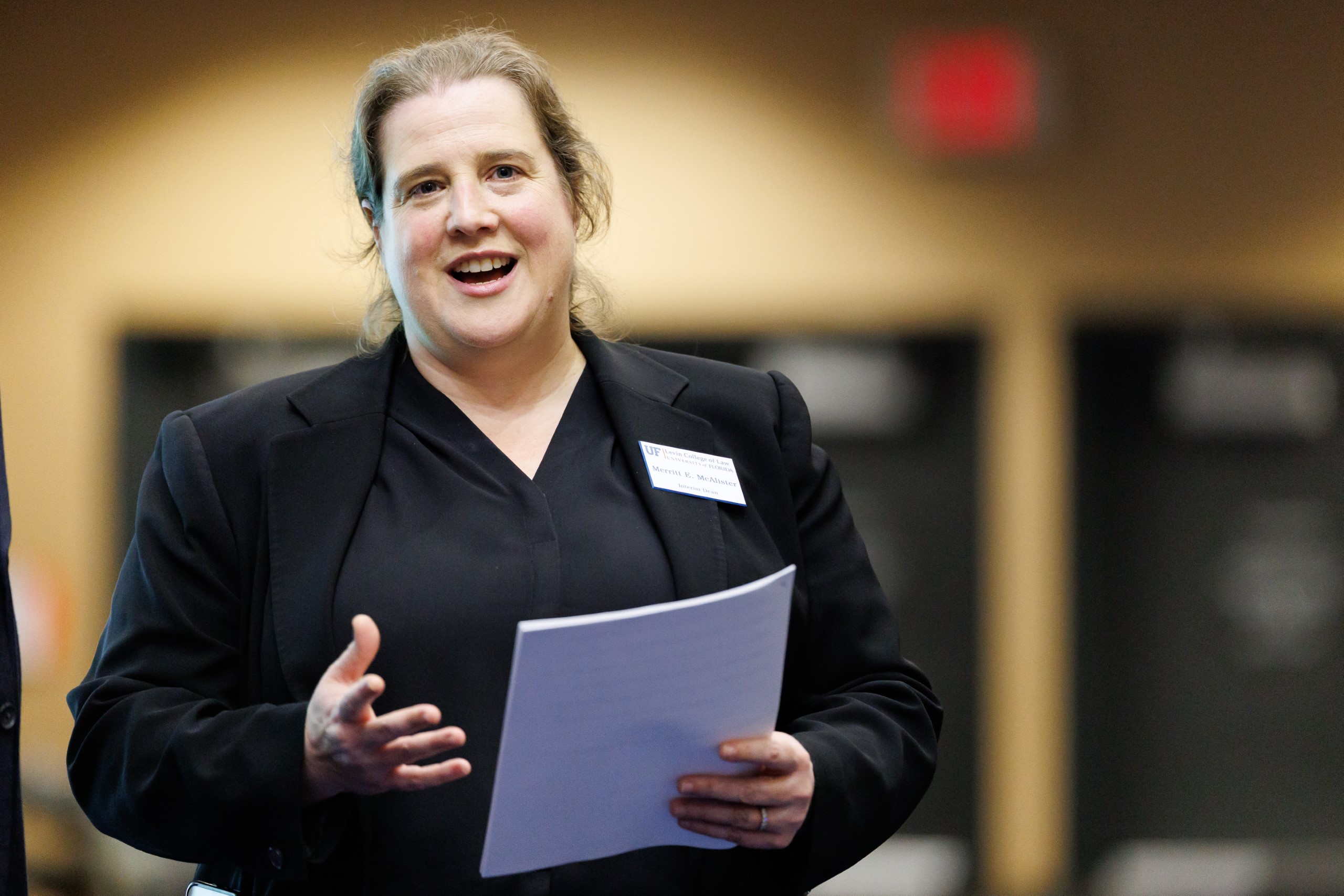 Dean Merritt McAlister makes the opening remarks at the celebration reception for UF Law's Professor Dennis Calfee and his 50 years of service to the law school. The celebration was held on Friday, November 15 at the University of Florida's Champions Club at Ben Hill Griffin Stadium. The reception included remarks from Masters of Ceremony Judge Robert Luck (JD 04), U.S. Circuit Judge, U.S. Court of Appeals for the 11th Circuit, and Judge Kathryn Kimball Mizelle (JD 12), District Judge, U.S. District Court for the Middle District of Florida. Additional guest speakers reflected on Professor Calfee's 50 year career and the impact that he has had at UF Law and beyond. After recognitions and presentations, Judge Luck and Judge Mizelle made the closing remarks.
