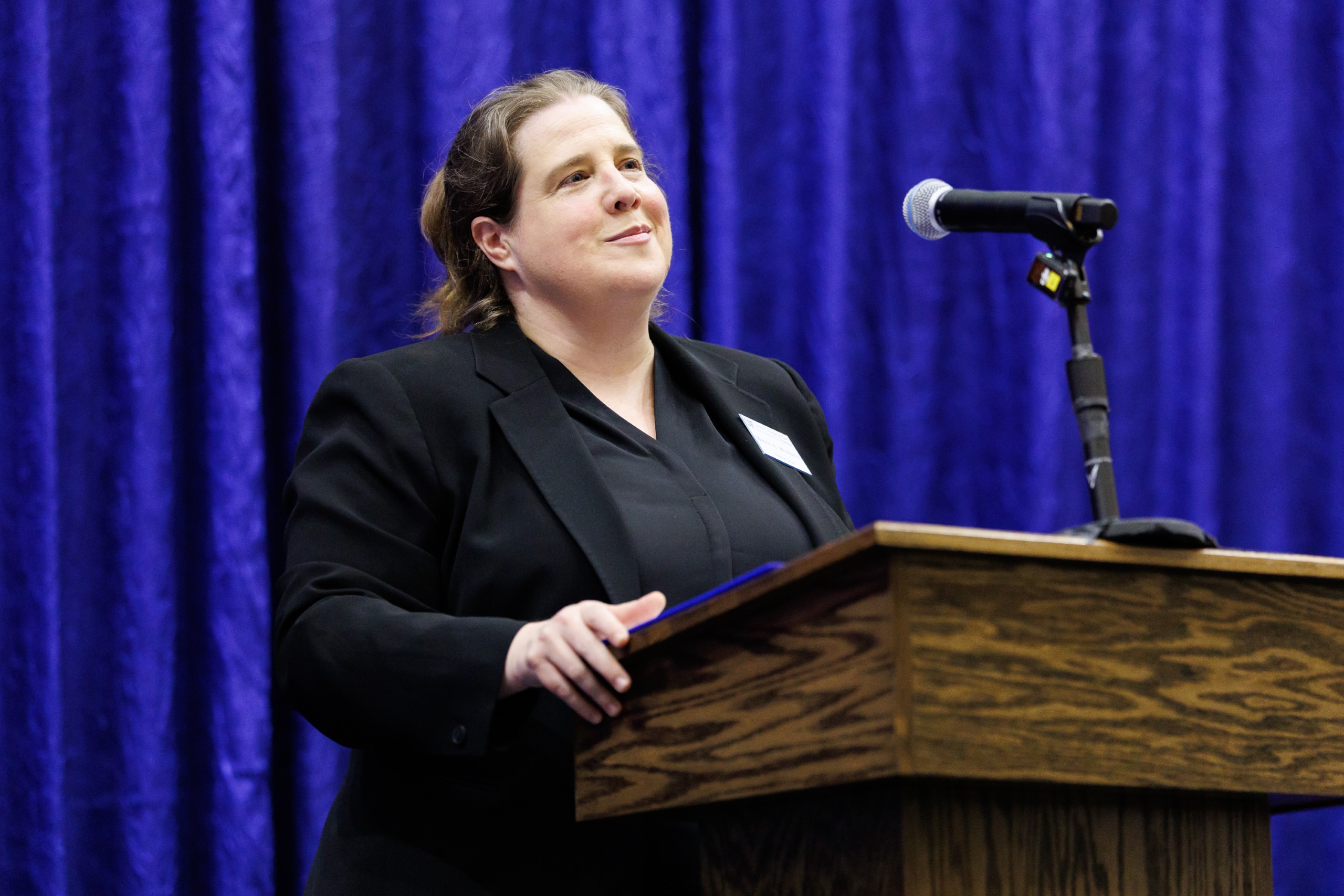 Dean Merritt McAlister makes the opening remarks at the celebration reception for UF Law's Professor Dennis Calfee and his 50 years of service to the law school. The celebration was held on Friday, November 15 at the University of Florida's Champions Club at Ben Hill Griffin Stadium. The reception included remarks from Masters of Ceremony Judge Robert Luck (JD 04), U.S. Circuit Judge, U.S. Court of Appeals for the 11th Circuit, and Judge Kathryn Kimball Mizelle (JD 12), District Judge, U.S. District Court for the Middle District of Florida. Additional guest speakers reflected on Professor Calfee's 50 year career and the impact that he has had at UF Law and beyond. After recognitions and presentations, Judge Luck and Judge Mizelle made the closing remarks.