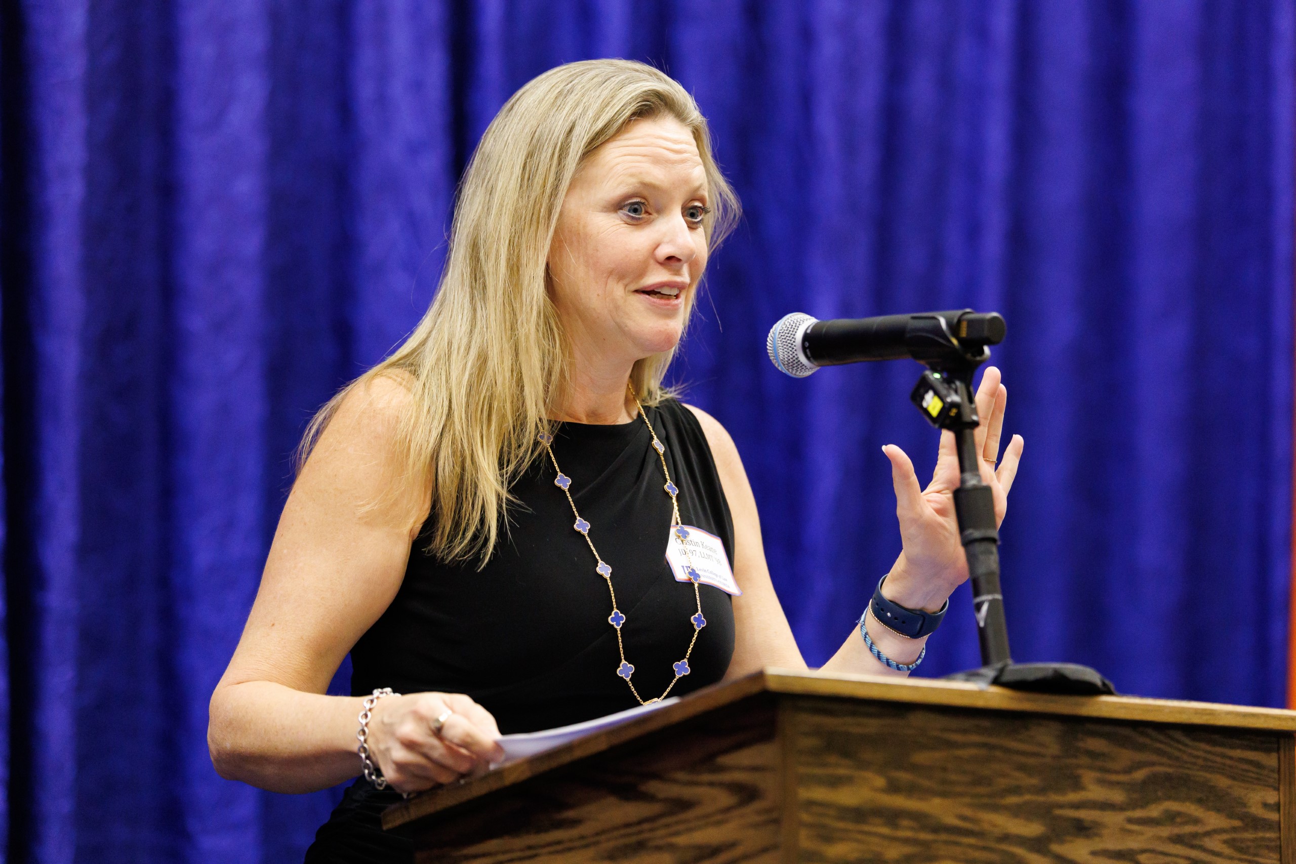 Guest speakers address the audience at the celebration reception for UF Law's Professor Dennis Calfee and his 50 years of service to the law school. The celebration was held on Friday, November 15 at the University of Florida's Champions Club at Ben Hill Griffin Stadium. The reception included a welcome from Dean Merritt McAlister, and remarks from Masters of Ceremony Judge Robert Luck (JD 04), U.S. Circuit Judge, U.S. Court of Appeals for the 11th Circuit, and Judge Kathryn Kimball Mizelle (JD 12), District Judge, U.S. District Court for the Middle District of Florida. Additional guest speakers reflected on Professor Calfee's 50 year career and the impact that he has had at UF Law and beyond. After recognitions and presentations, Judge Luck and Judge Mizelle made the closing remarks.