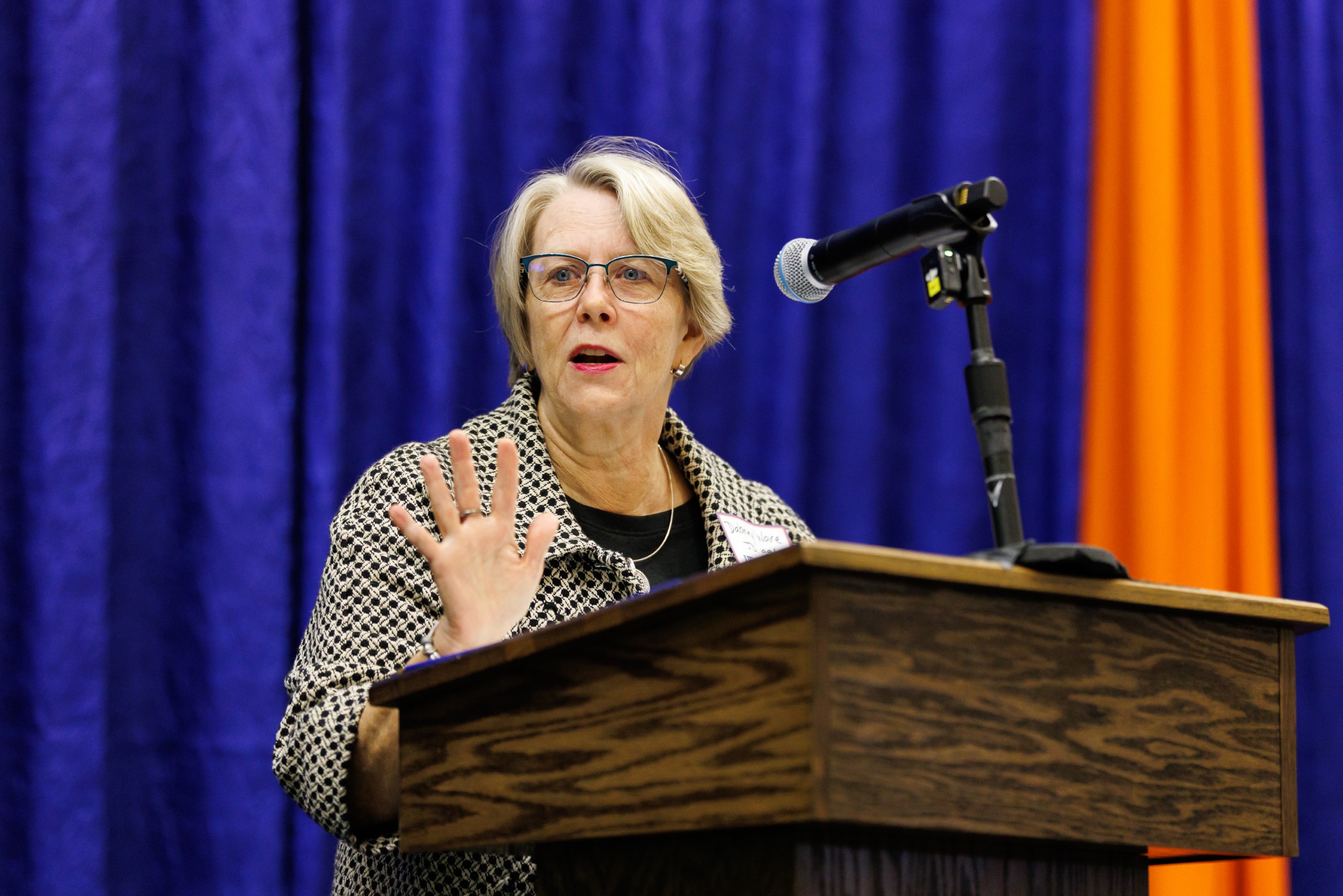 Guest speakers address the audience at the celebration reception for UF Law's Professor Dennis Calfee and his 50 years of service to the law school. The celebration was held on Friday, November 15 at the University of Florida's Champions Club at Ben Hill Griffin Stadium. The reception included a welcome from Dean Merritt McAlister, and remarks from Masters of Ceremony Judge Robert Luck (JD 04), U.S. Circuit Judge, U.S. Court of Appeals for the 11th Circuit, and Judge Kathryn Kimball Mizelle (JD 12), District Judge, U.S. District Court for the Middle District of Florida. Additional guest speakers reflected on Professor Calfee's 50 year career and the impact that he has had at UF Law and beyond. After recognitions and presentations, Judge Luck and Judge Mizelle made the closing remarks.