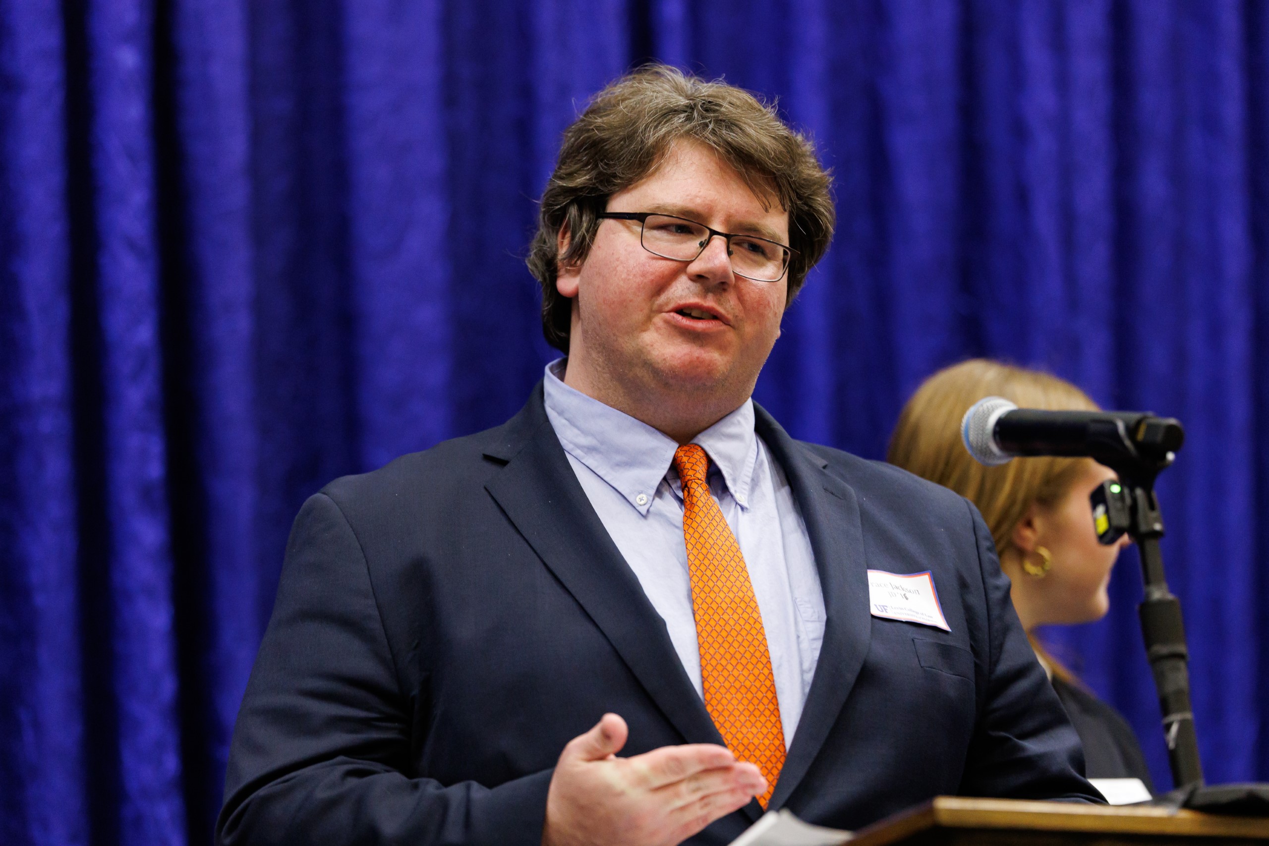 Judge Robert Luck (JD 04), U.S. Circuit Judge, U.S. Court of Appeals for the 11th Circuit, speaks at the celebration reception for UF Law's Professor Dennis Calfee and his 50 years of service to the law school. Judge Luck and Judge Kathryn Kimball Mizelle (JD 12), District Judge, U.S. District Court for the Middle District of Florida, served as the Masters of Ceremony at the Friday, November 15 event.
