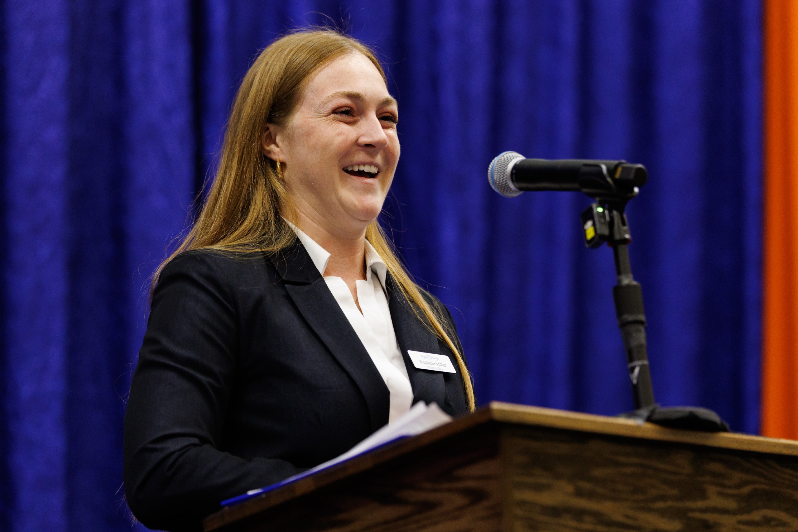 Guest speakers address the audience at the celebration reception for UF Law's Professor Dennis Calfee and his 50 years of service to the law school. The celebration was held on Friday, November 15 at the University of Florida's Champions Club at Ben Hill Griffin Stadium. The reception included a welcome from Dean Merritt McAlister, and remarks from Masters of Ceremony Judge Robert Luck (JD 04), U.S. Circuit Judge, U.S. Court of Appeals for the 11th Circuit, and Judge Kathryn Kimball Mizelle (JD 12), District Judge, U.S. District Court for the Middle District of Florida. Additional guest speakers reflected on Professor Calfee's 50 year career and the impact that he has had at UF Law and beyond. After recognitions and presentations, Judge Luck and Judge Mizelle made the closing remarks.